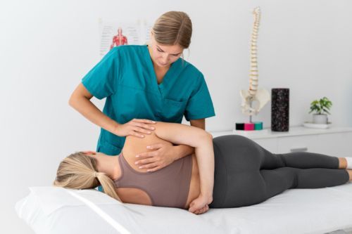 Woman receiving chiropractic care